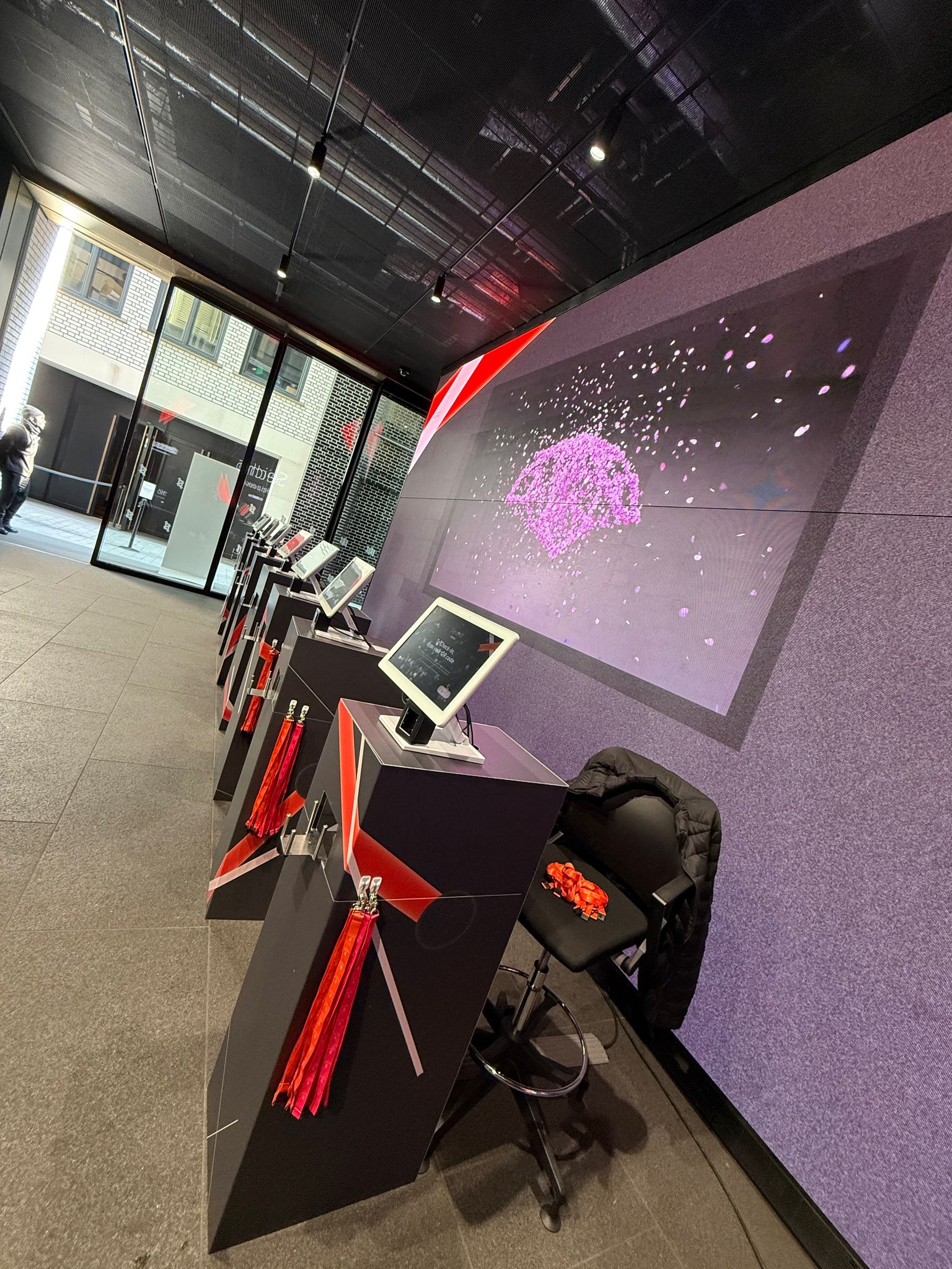 Branded Xtag kiosk at an event entrance